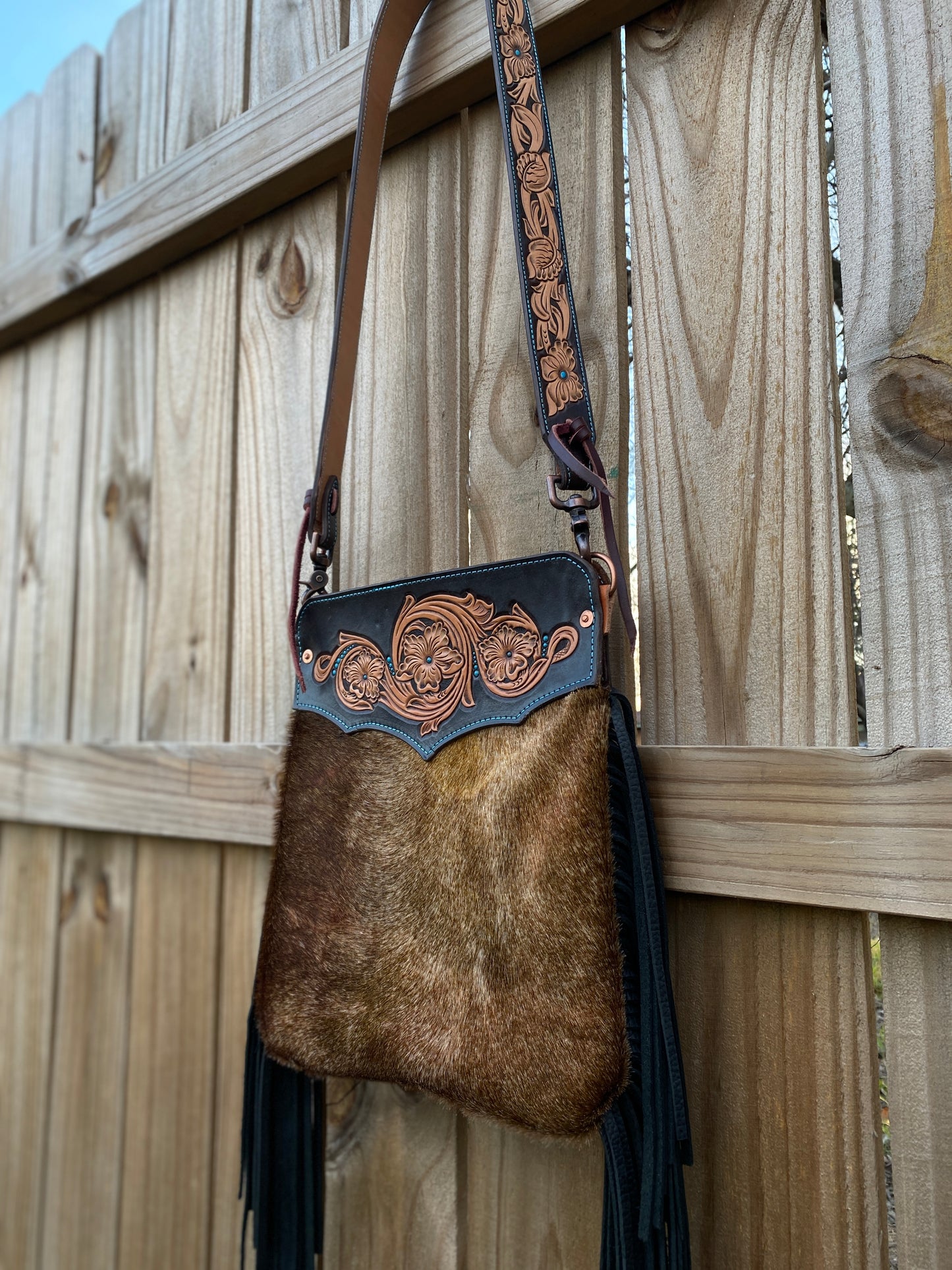 Floral cowhide fringy purse